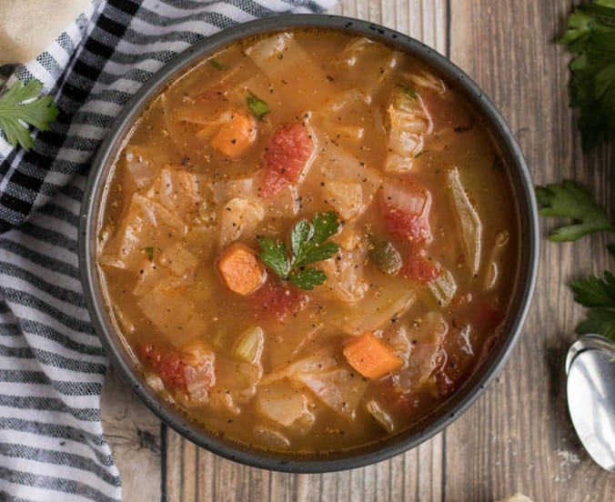 Cleansing recipes - a bowl of vegan cabbage soup on a table