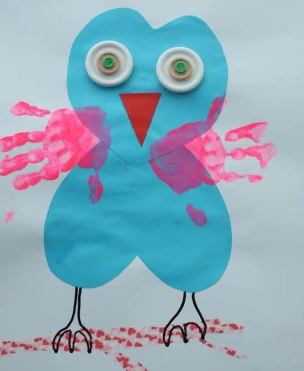 Valentine's Day craft: owl made from painted hearts and handprints