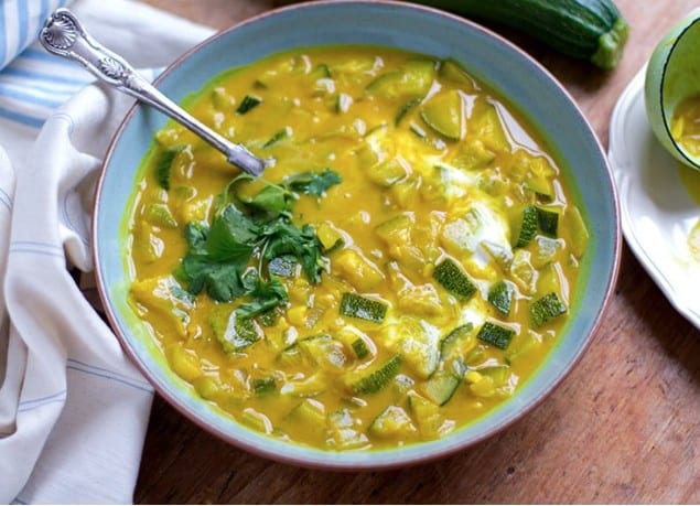 detox recipes - a bowl of turmeric zucchini soup