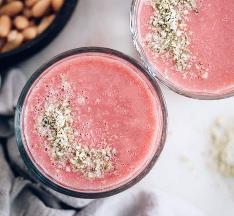 detox recipes - two glasses of vegan strawberry white bean smoothie with hemp hearts