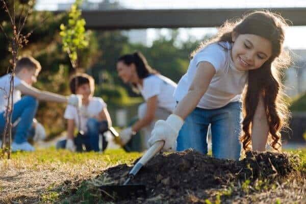 a family gardens together