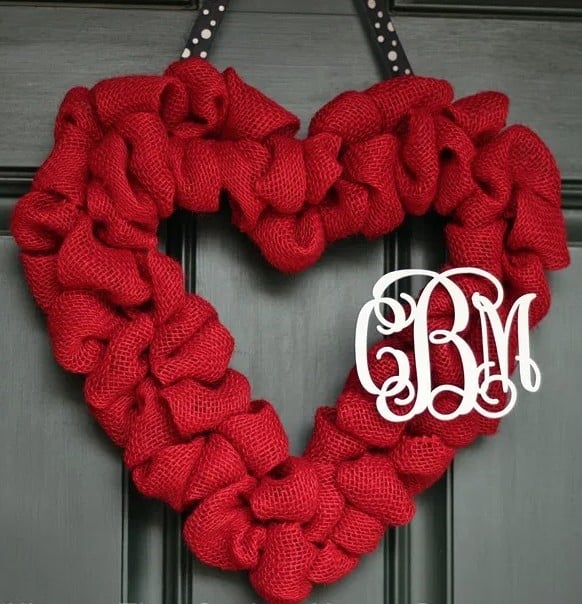 Valentine’s Day Red Burlap Heart Wreath with Couple’s Monogram displayed against a black door