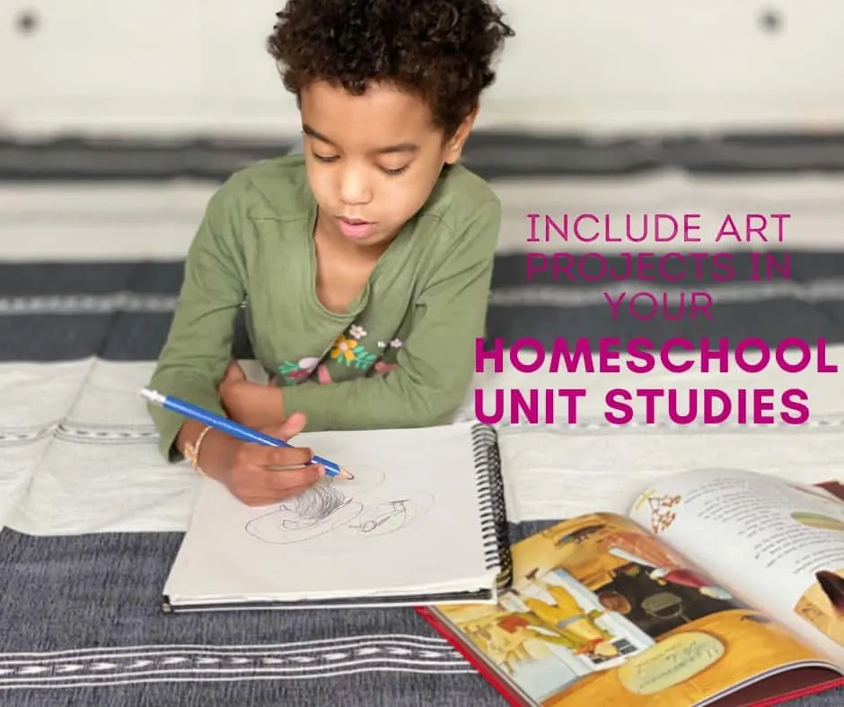 a little girl lies on the floor reading a book about birds and drawing pictures of birds. This is an easy way to incorporate art into your homeschool unit studies