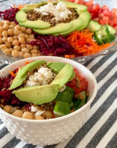 beet salad with feta and chickpeas can be served in an individual bowl or on a large platter