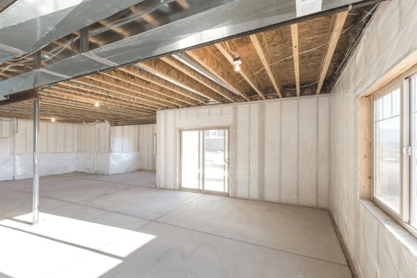 insulate your basement to reduce heat loss and keep your house warmer