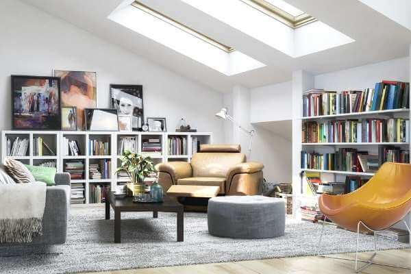 a homeschool room with lots of bookshelves