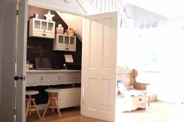 a homeschool workstation in a hallway closet