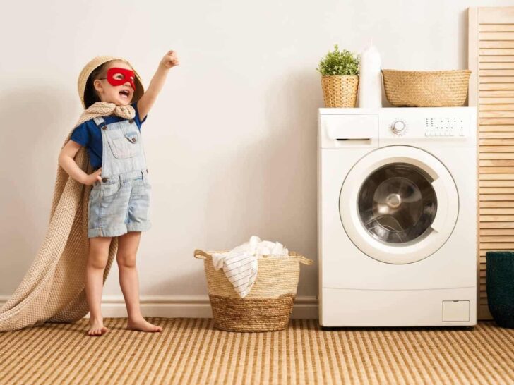 superhero kid with washing machine