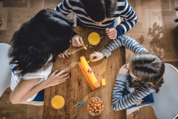 a family bonds over a board game