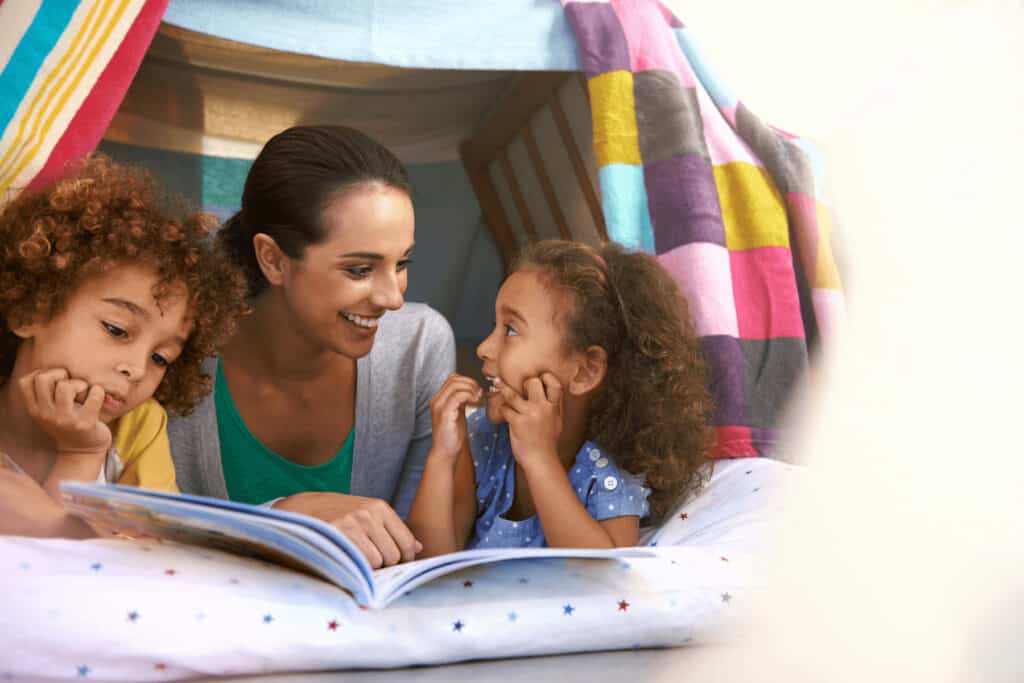 a mother and two daughters in a fort