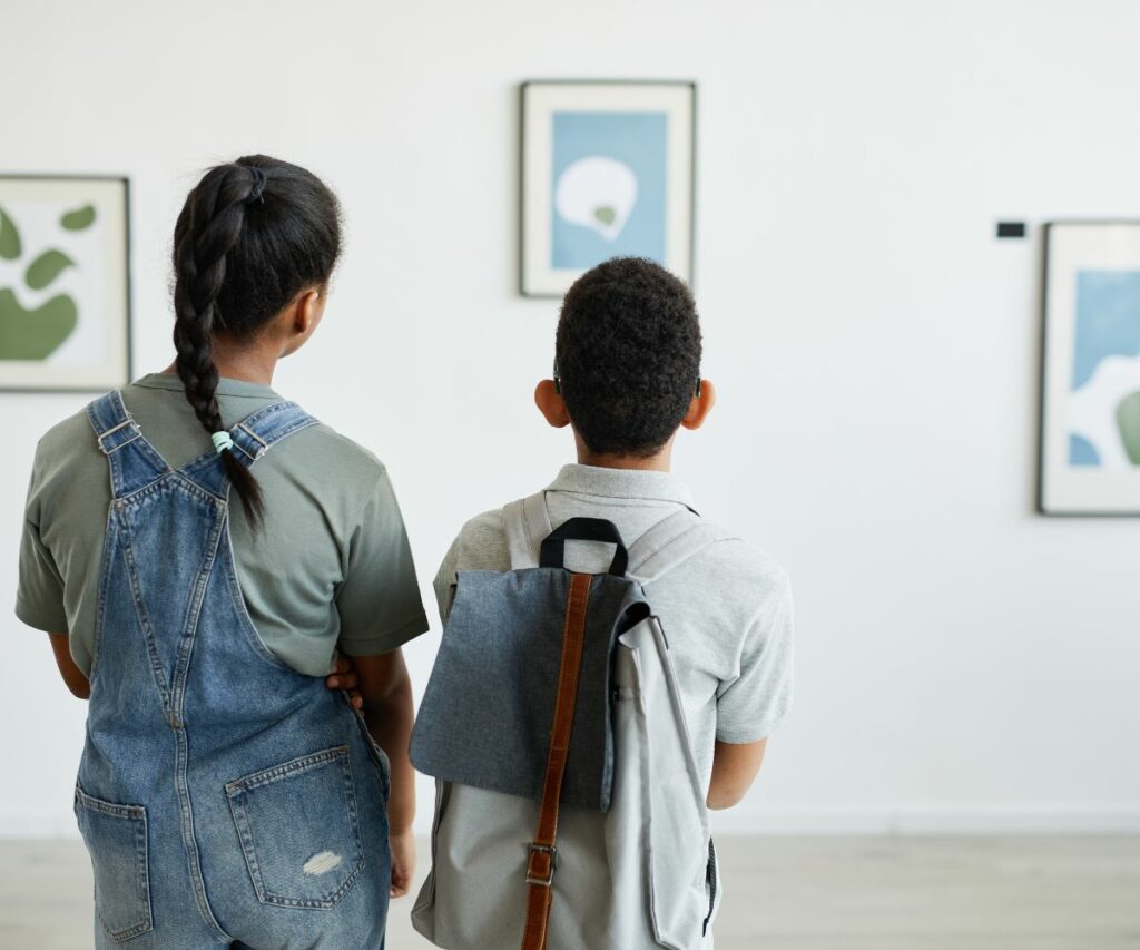 two teens at an art gallery