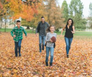 family playing football